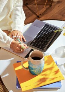 woman at desk working girl boss personal branding personal brand