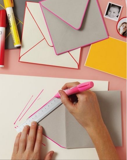 woman using pink pen to draw homemade birthday card. This shows drawing is important in every part of life. 